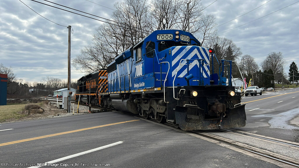 WE 7006 crosses Gilchrist Rd. on the Akron Sub.